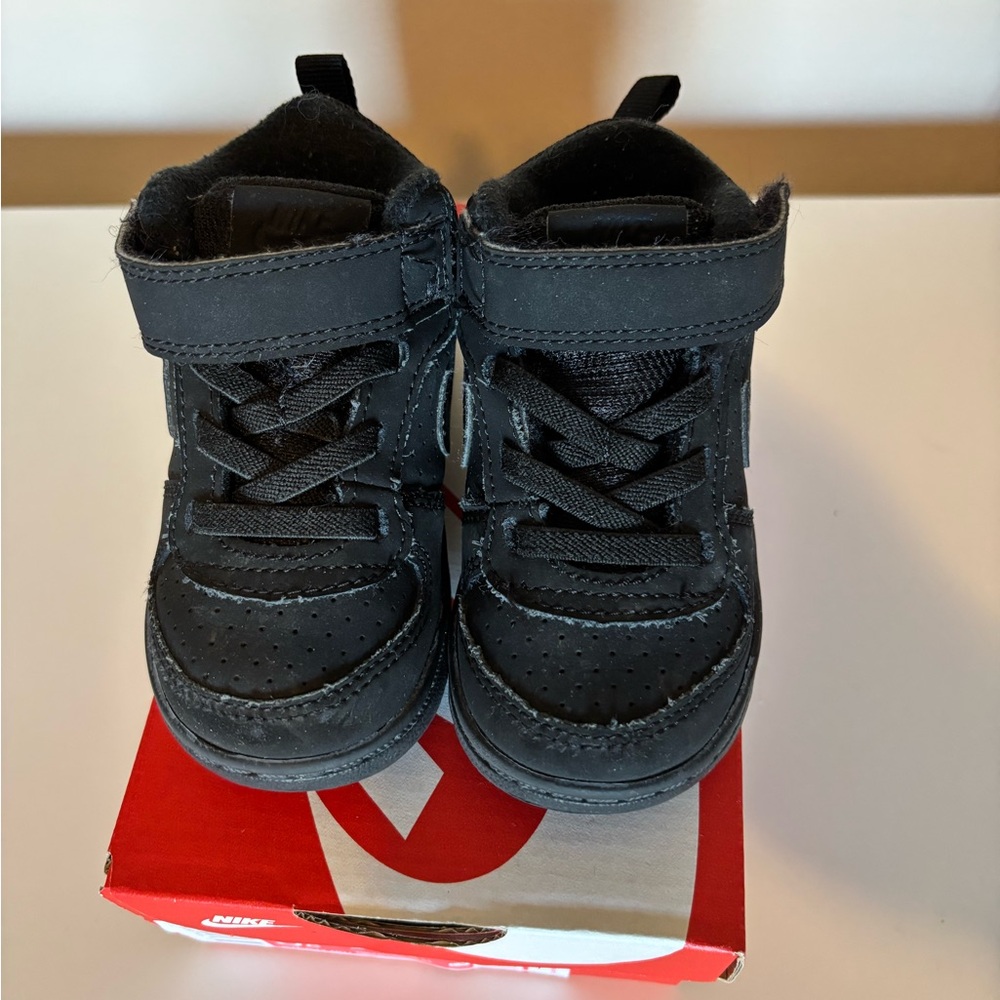 Nike black high top courts